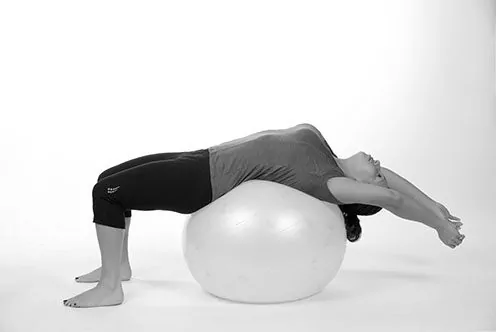 expansive breathing exercise over stability ball - self-care