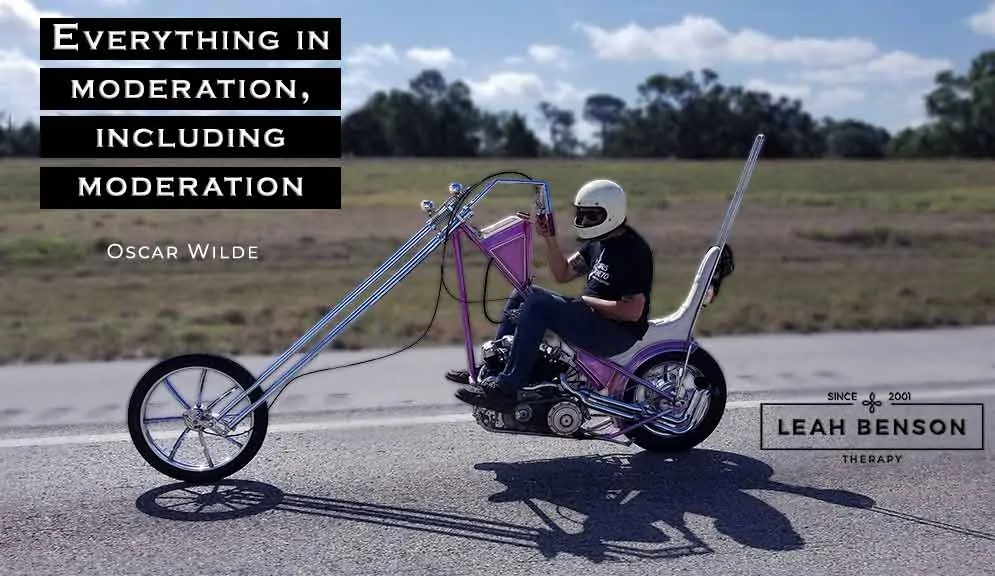 Photo of a guy riding a chopper with text, "Everything in Moderation, Including Moderation "
