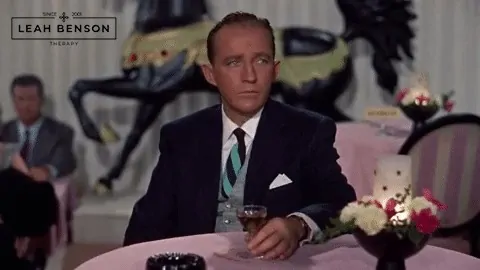 Bing Crosby at table