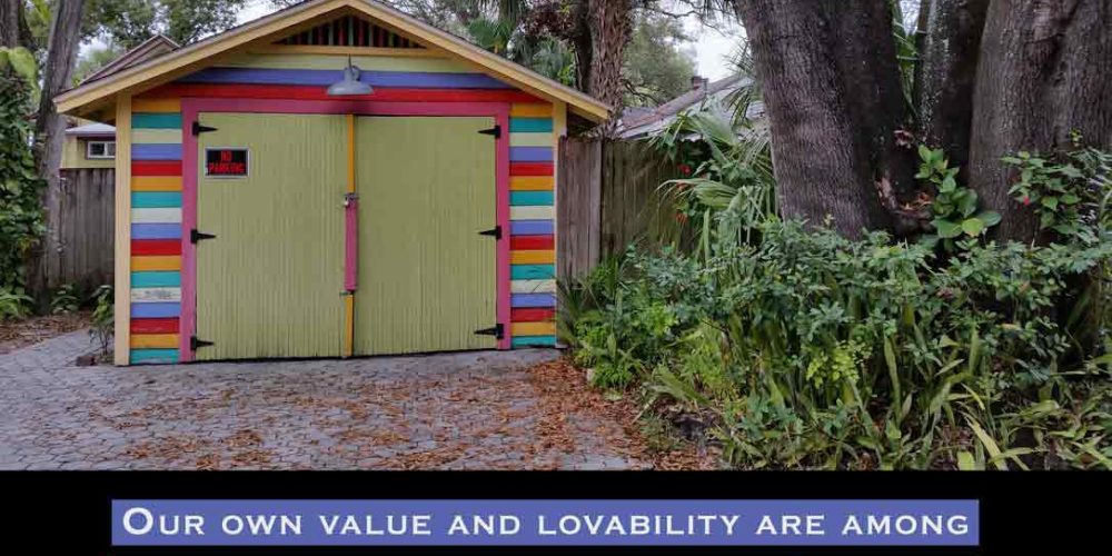 "Our own value and lovability are among the lessons that we don't remember learning, but never forget" quote by Louis Cozolino - photo of a colorful garage and palm trees.